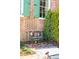 Ornate black bench in a brick courtyard at 43 Hasell St, Charleston, SC 29401