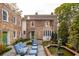 Relaxing courtyard with seating area and a fountain at 43 Hasell St, Charleston, SC 29401