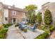 Charming brick courtyard with seating area and fountain at 43 Hasell St, Charleston, SC 29401