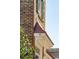 Brick building exterior with green shutters and a copper roof at 43 Hasell St, Charleston, SC 29401
