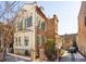 Charming brick home with a classic design, featuring a landscaped yard and gated driveway at 43 Hasell St, Charleston, SC 29401