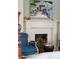 Marble fireplace in a light blue bedroom at 43 Hasell St, Charleston, SC 29401