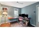Spacious home office with dual monitors and hardwood floors at 43 Hasell St, Charleston, SC 29401