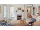 Spacious living room with fireplace and comfortable seating at 43 Hasell St, Charleston, SC 29401