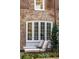 Relaxing patio with lounge chairs and lush greenery at 43 Hasell St, Charleston, SC 29401