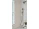 Clean shower with white subway tile and chrome fixtures at 43 Hasell St, Charleston, SC 29401