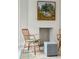 Relaxing sitting area with rattan chairs and ottoman at 43 Hasell St, Charleston, SC 29401