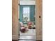 Charming sitting room with comfortable armchairs and a cozy atmosphere at 43 Hasell St, Charleston, SC 29401