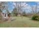 Large grassy backyard with shed and privacy fence at 4334 Bream Rd, North Charleston, SC 29418