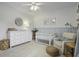 Bedroom featuring white dresser, crib, and neutral color scheme at 4334 Bream Rd, North Charleston, SC 29418