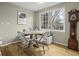 Charming breakfast nook with built-in bench seating and wood table at 4334 Bream Rd, North Charleston, SC 29418