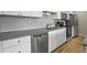White shaker cabinets, granite countertops, and stainless steel appliances at 4334 Bream Rd, North Charleston, SC 29418