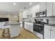 Updated kitchen with island, stainless steel appliances, and granite counters at 4334 Bream Rd, North Charleston, SC 29418