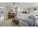 Living area with a piano, sectional sofa, and hardwood floors at 4334 Bream Rd, North Charleston, SC 29418