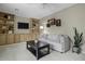 Light-filled living room with built-in shelves, a sofa, and a ceiling fan at 4334 Bream Rd, North Charleston, SC 29418