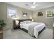 Spacious main bedroom with plush carpeting and ceiling fan at 4334 Bream Rd, North Charleston, SC 29418