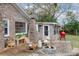 Brick patio with fire pit and comfortable seating at 4334 Bream Rd, North Charleston, SC 29418