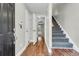 Bright and spacious entryway with hardwood floors and staircase at 5009 Double Fox Rd # H5, Charleston, SC 29414