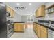 Kitchen with stainless steel appliances and wood cabinets at 5009 Double Fox Rd # H5, Charleston, SC 29414