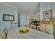 Spacious dining room with hardwood floors and a view into the kitchen at 5135 Coral Reef Dr, Johns Island, SC 29455