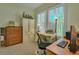 Home office featuring a desk, chair, and built-in shelving at 5135 Coral Reef Dr, Johns Island, SC 29455