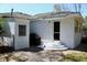 Backyard featuring brick exterior, steps, grill and a fenced-in yard at 5242 Potomac St, North Charleston, SC 29405