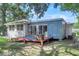 Spacious backyard with deck, patio, and ample green space at 5242 Potomac St, North Charleston, SC 29405