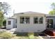 Backyard featuring brick exterior, deck and lots of windows at 5242 Potomac St, North Charleston, SC 29405