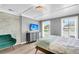 Bright bedroom with wood floors and a gray accent wall at 5242 Potomac St, North Charleston, SC 29405