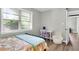 Bedroom with a bed, desk, chair, and window with blinds at 5242 Potomac St, North Charleston, SC 29405