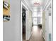 Light-filled hallway with access to bedroom and closet at 5242 Potomac St, North Charleston, SC 29405