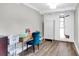 Bright home office with wood desk and teal chair at 5242 Potomac St, North Charleston, SC 29405