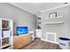 Playroom featuring built-in shelving and a TV at 5242 Potomac St, North Charleston, SC 29405