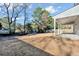 Spacious backyard with covered patio and mature trees at 5889 N Rhett Ave, Hanahan, SC 29410