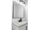 Bathroom with a modern vanity, large mirror, and black fixtures at 5889 N Rhett Ave, Hanahan, SC 29410