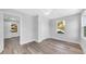 Spacious bedroom with neutral walls and wood-look floors at 5889 N Rhett Ave, Hanahan, SC 29410