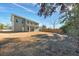 Two-story home with backyard and wooden fence at 5889 N Rhett Ave, Hanahan, SC 29410