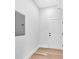 Laundry area with vinyl flooring and white door at 5889 N Rhett Ave, Hanahan, SC 29410