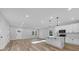 Open concept living space with hardwood floors and lots of natural light at 5889 N Rhett Ave, Hanahan, SC 29410