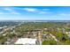 Wide aerial view showing the property and surrounding neighborhood, including a bridge and river at 712 S Shelmore Blvd # 15, Mount Pleasant, SC 29464