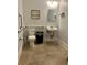 Accessible bathroom featuring grab bars, toilet, and a wall-mounted sink, ensuring safety and convenience at 712 S Shelmore Blvd # 15, Mount Pleasant, SC 29464