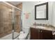 Clean bathroom with granite vanity, shower, and toilet at 712 S Shelmore Blvd # 15, Mount Pleasant, SC 29464