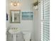 Small bathroom with pedestal sink and white toilet at 712 S Shelmore Blvd # 15, Mount Pleasant, SC 29464