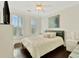 Bright bedroom with a king-size bed and hardwood floors at 712 S Shelmore Blvd # 15, Mount Pleasant, SC 29464