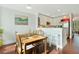 Casual dining area with wood table and hardwood floors at 712 S Shelmore Blvd # 15, Mount Pleasant, SC 29464