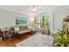 Relaxing living room with hardwood floors and large windows at 712 S Shelmore Blvd # 15, Mount Pleasant, SC 29464