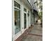 Storefronts along a clean sidewalk with brick accents and landscaping at 712 S Shelmore Blvd # 15, Mount Pleasant, SC 29464