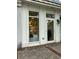Modern storefront with large windows and a glass door, located in a commercial building at 712 S Shelmore Blvd # 15, Mount Pleasant, SC 29464