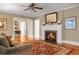 Living room features hardwood floors, fireplace, and area rug at 917 S Main St, Summerville, SC 29483