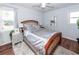 Bright bedroom with wood flooring, double bed, and ample natural light at 9772 Berrywood Dr, Ladson, SC 29456